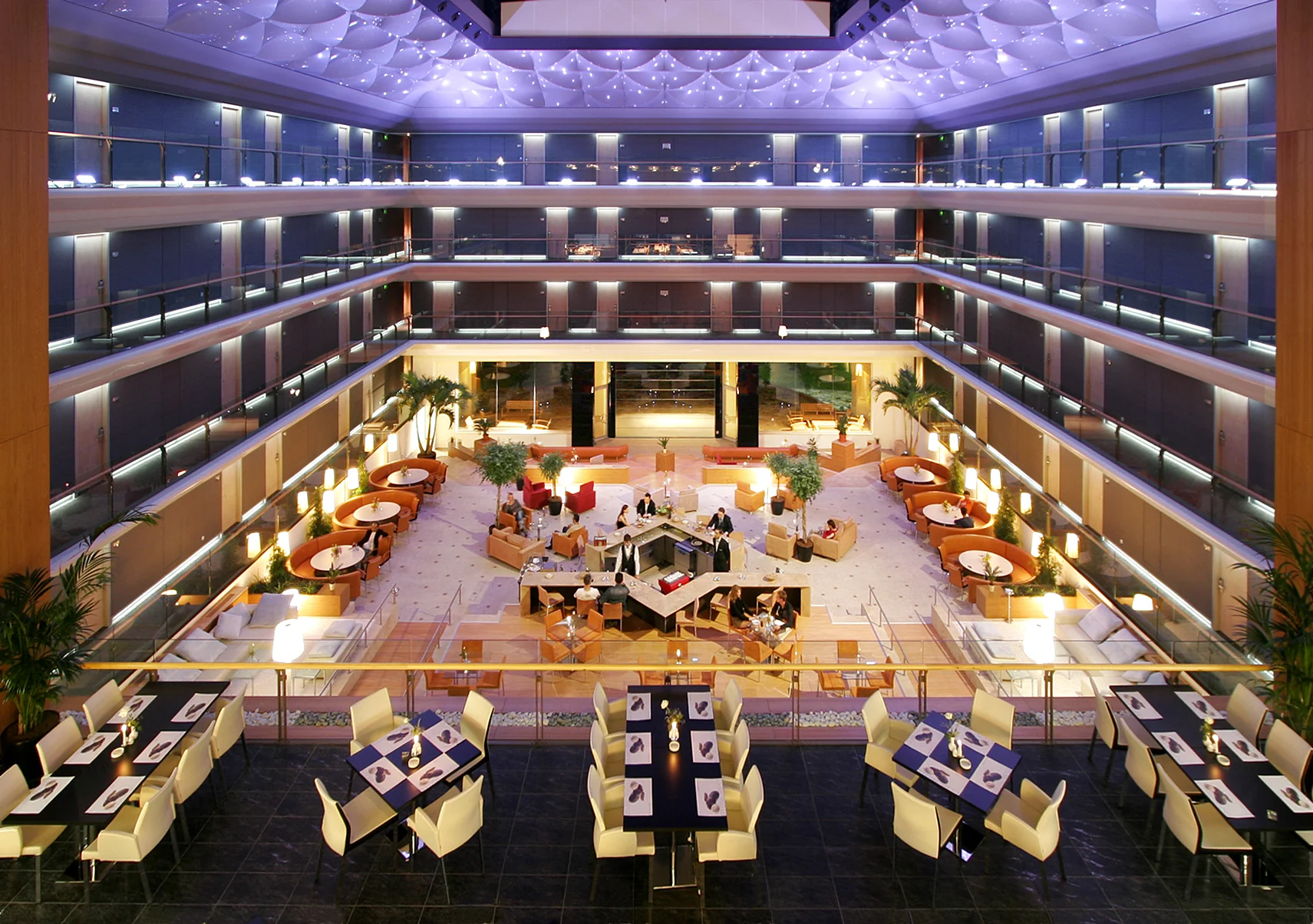 Atrium at Richmond Nua with tables set up for dining - winter getaway
